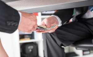 under the table, cash